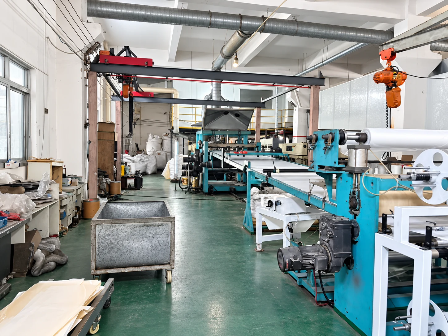 Retouched photograph of the family manufacturing workshop production line